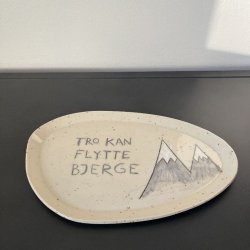 Fad med teksten "Tro kan flytte bjerge"