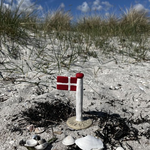Flag med teksten "Tillykke"