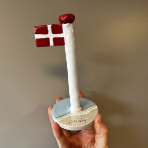 Keramik flag med teksten 