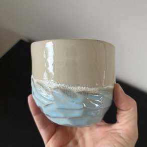 Drejet krus i hav nuancer