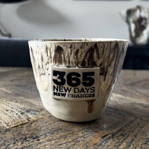 Krus med teksten 