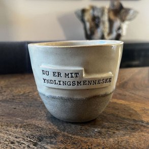 Krus med teksten 