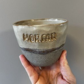 Krus med teksten 